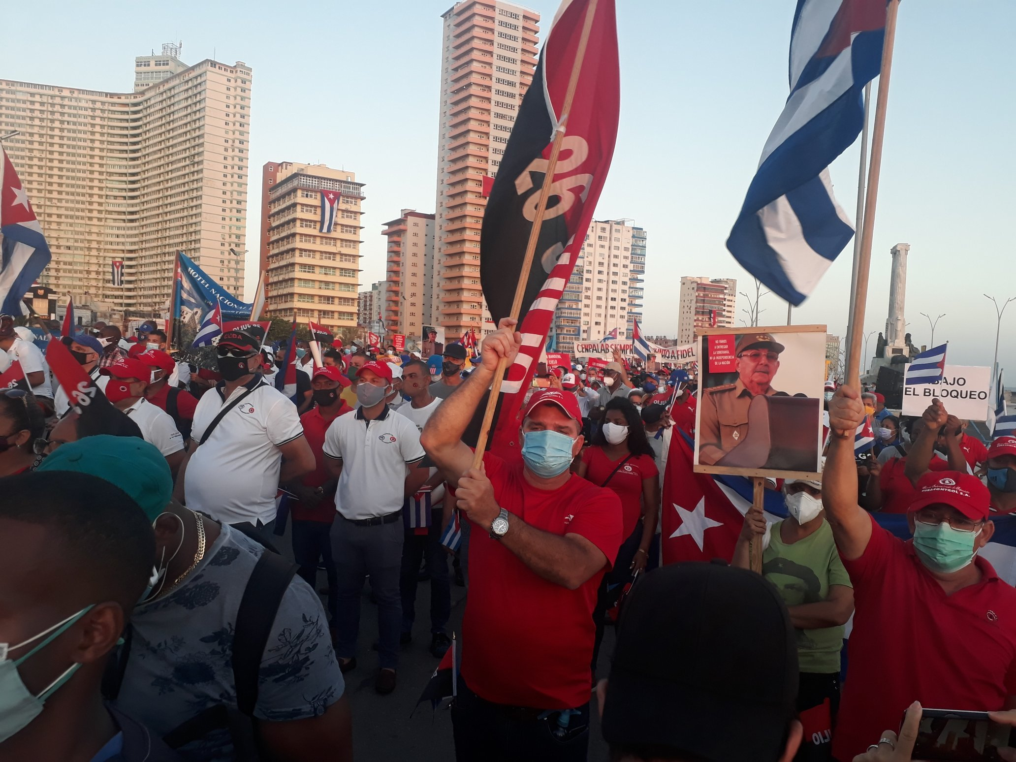 Source of supporters holding high the banner of 