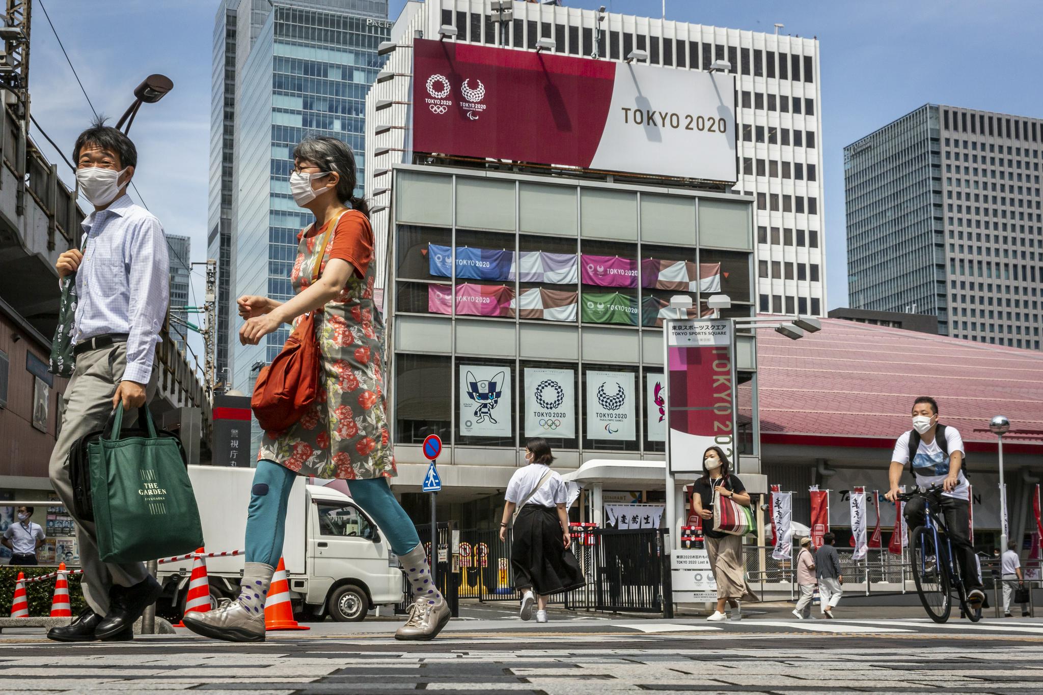 奥运志愿者遭路人白眼东京街头没有奥运氛围