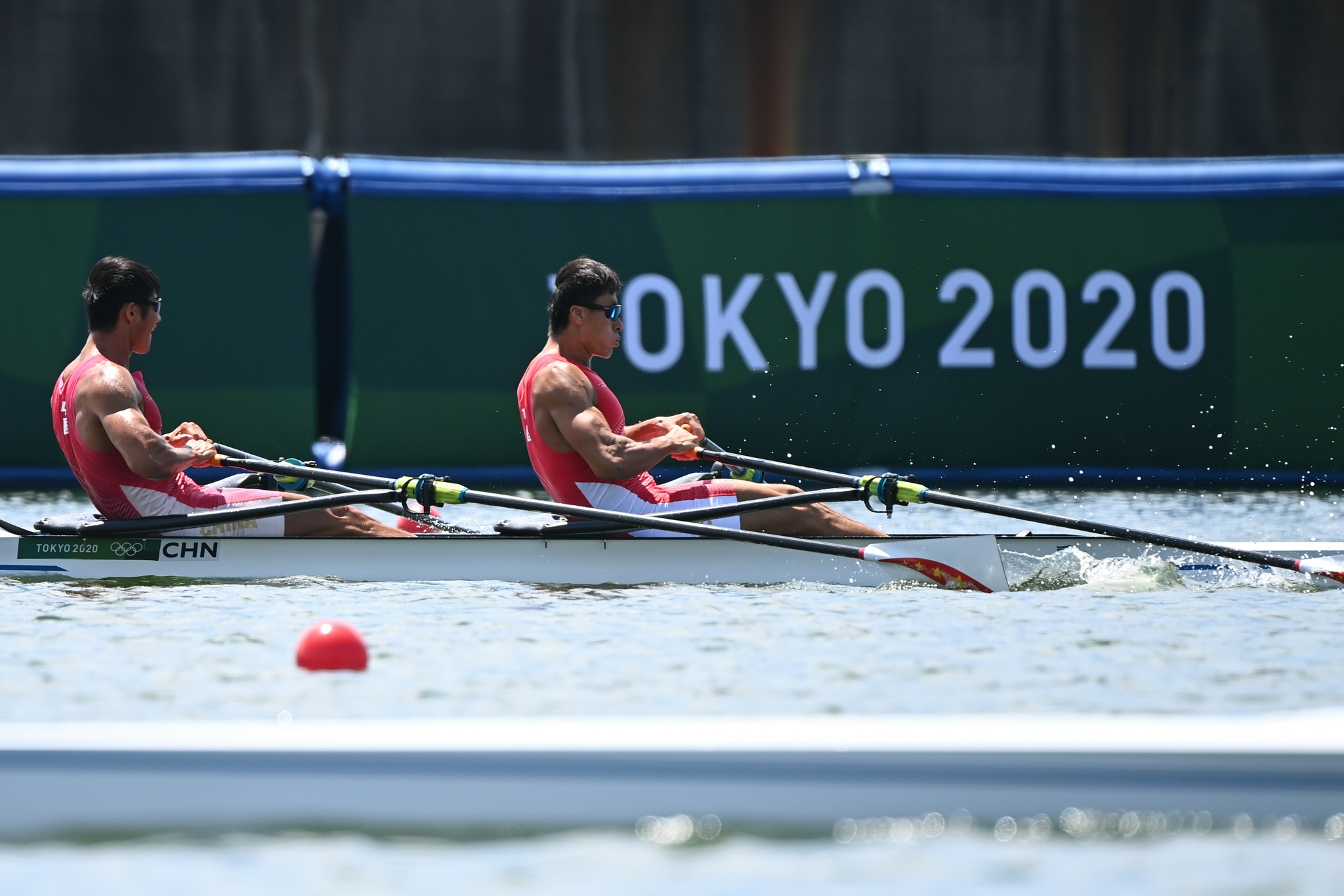7月23日,中国队在男子四人双桨预赛中.新华社记者 戴天放 摄