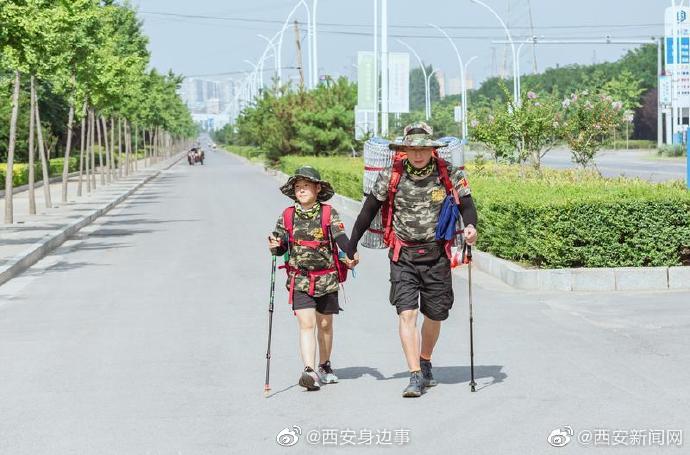 父子俩从西安徒步到北京 虽然旅途艰辛 但可回味一生休闲区蓝鸢梦想 - Www.slyday.coM