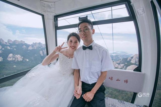 以山海见证!崂山这场集体婚礼浪漫又特别休闲区蓝鸢梦想 - Www.slyday.coM 以山海见证!崂山这场集体婚礼浪漫又特别休闲区蓝鸢梦想 - Www.slyday.coM