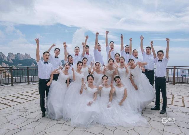 以山海见证!崂山这场集体婚礼浪漫又特别休闲区蓝鸢梦想 - Www.slyday.coM 以山海见证!崂山这场集体婚礼浪漫又特别休闲区蓝鸢梦想 - Www.slyday.coM