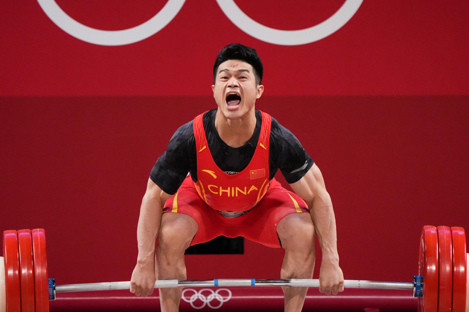 决战东京战况兑现诺言石智勇卫冕男子73公斤级举重冠军