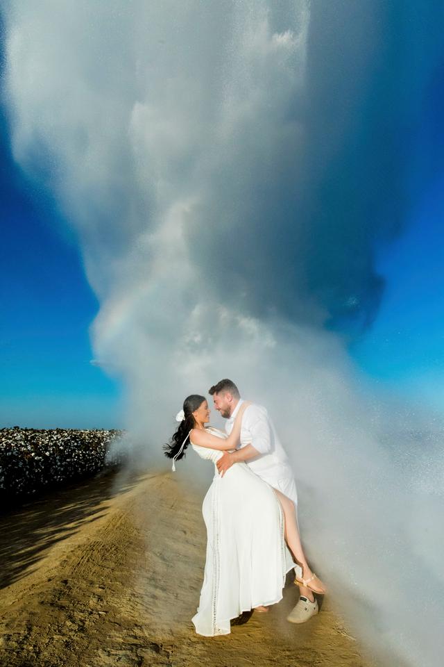 摄影师热爱推陈出新 巴西实景彩虹婚纱照 飞机倾倒900升水