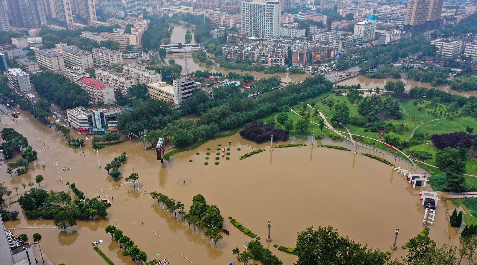多名华人运动员将奥运战袍捐给河南