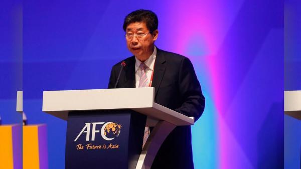 张吉龙的外交工作，对20年前中国男足打进世界杯功不可没，他本人也在2018年获得了亚足联最高荣誉——“亚洲之钻”奖，成为中国足球界获此殊荣的第一人，图源：CGTN