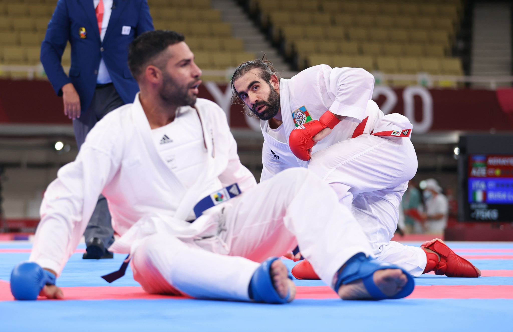 8月6日,意大利选手布萨(上)在比赛中.新华社记者 杜潇逸 摄