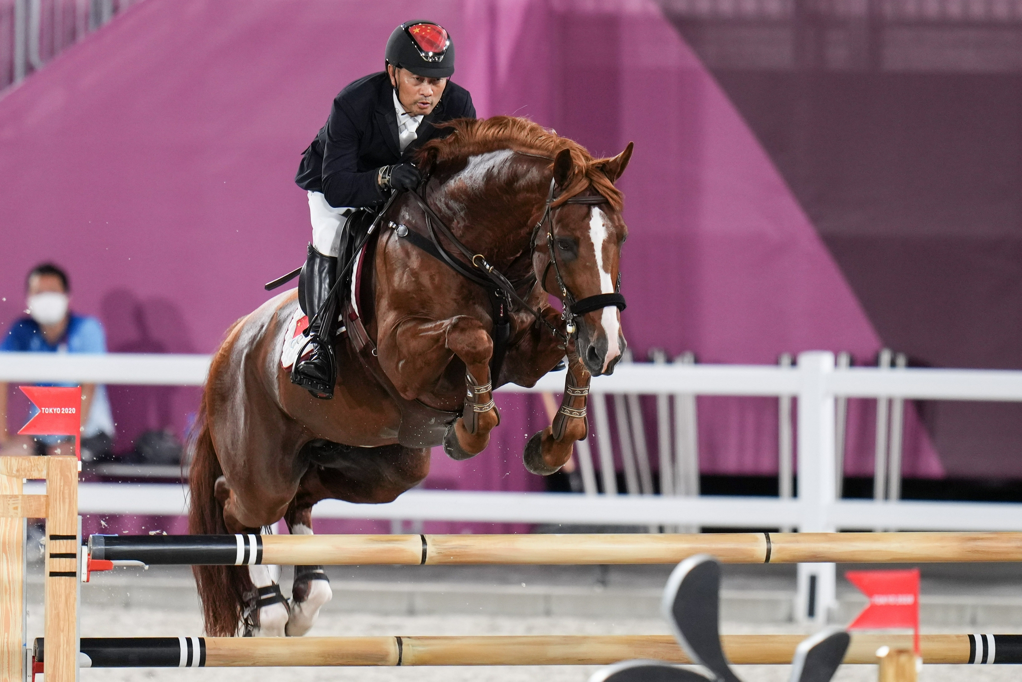 马术——中国运动员参加场地障碍团体比赛