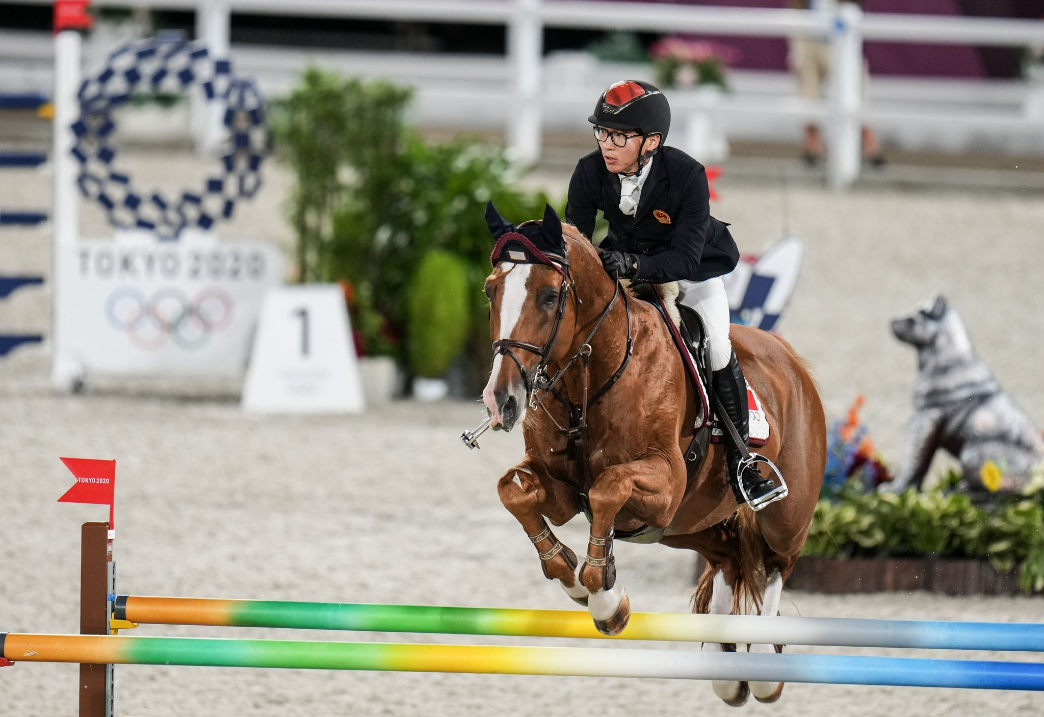 马术——中国运动员参加场地障碍团体比赛