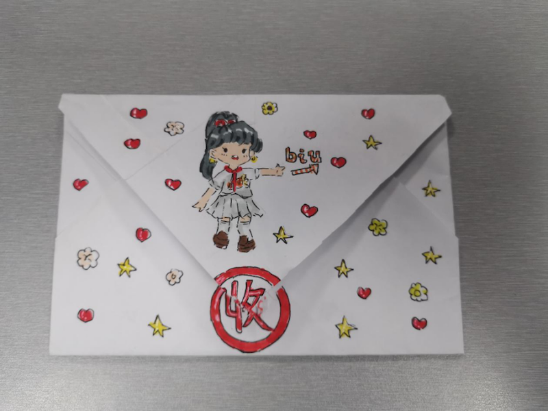 小朋友亲手制作的信封(央广网发 江北区公安分局供图)