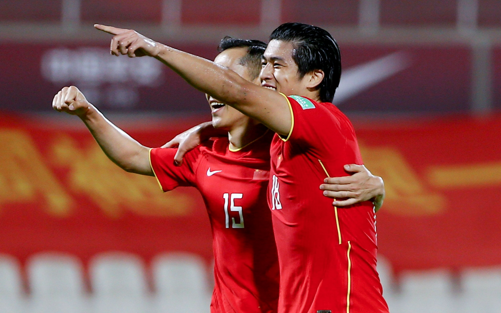 国足球员庆祝进球.资料图片/新华社