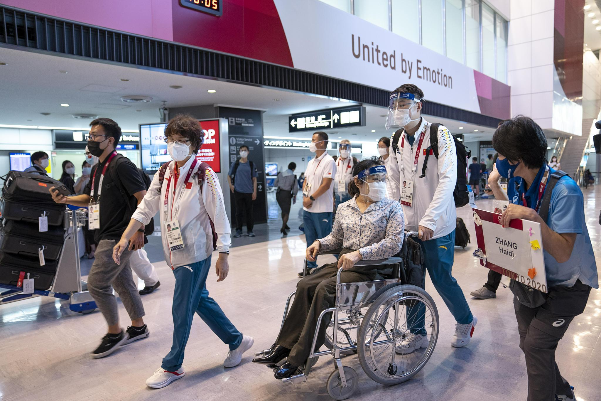 东京残奥会中国体育代表团第三批团队抵达东京休闲区蓝鸢梦想 - Www.slyday.coM