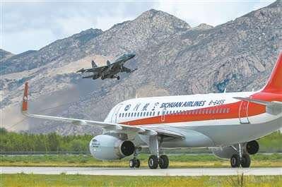 飞越雪海云天 尽览高原变迁——军民合力建设拉萨贡嘎国际机场推动西藏经济社会发展纪事休闲区蓝鸢梦想 - Www.slyday.coM