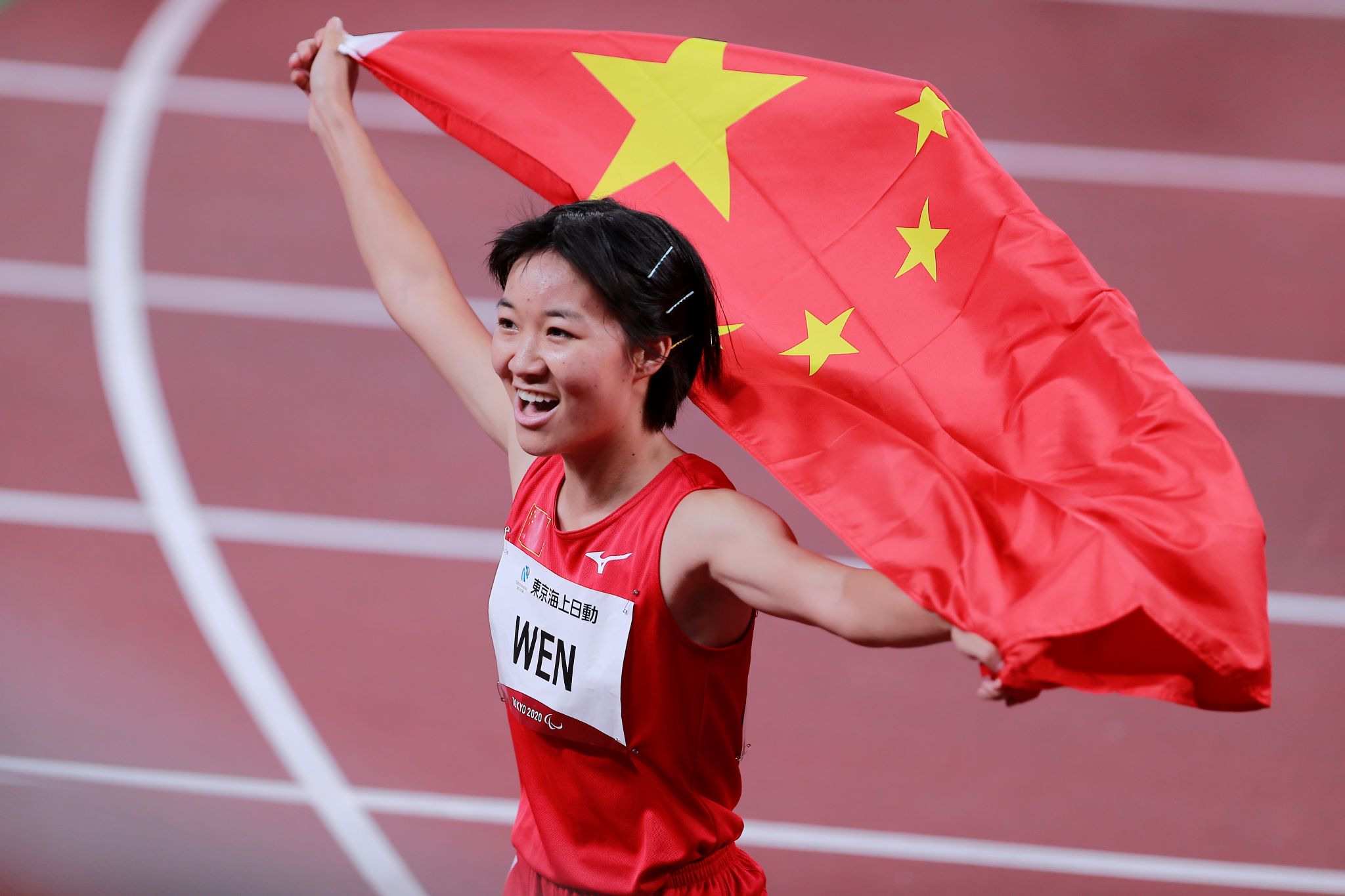 残奥会田径首日豪取4金 中国选手"跑跳投"样样行