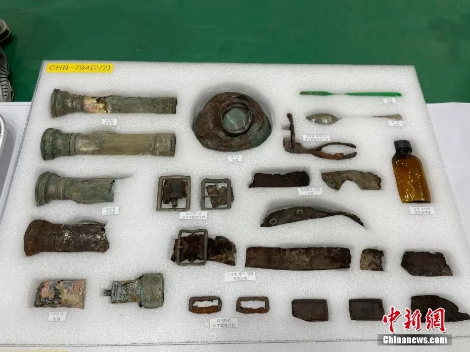 第八批在韩中国人民志愿军烈士遗骸装殓仪式。 中新社记者 刘旭 摄