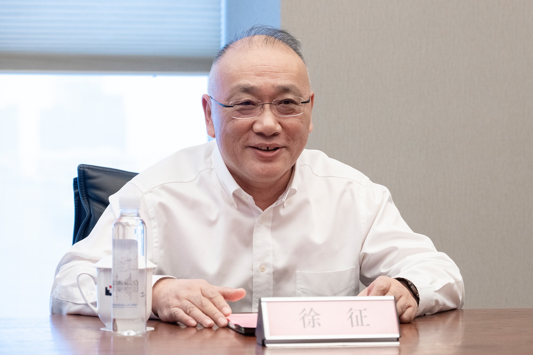 上海建工董事长徐征会见中微公司董事长尹志尧