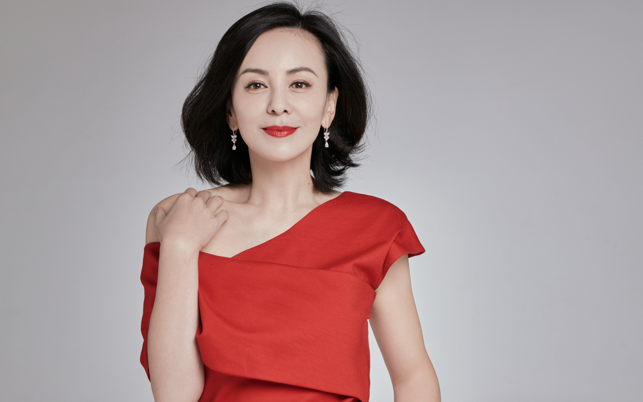 《情深深雨濛濛》中王雪琴一角),和她本人相差甚远