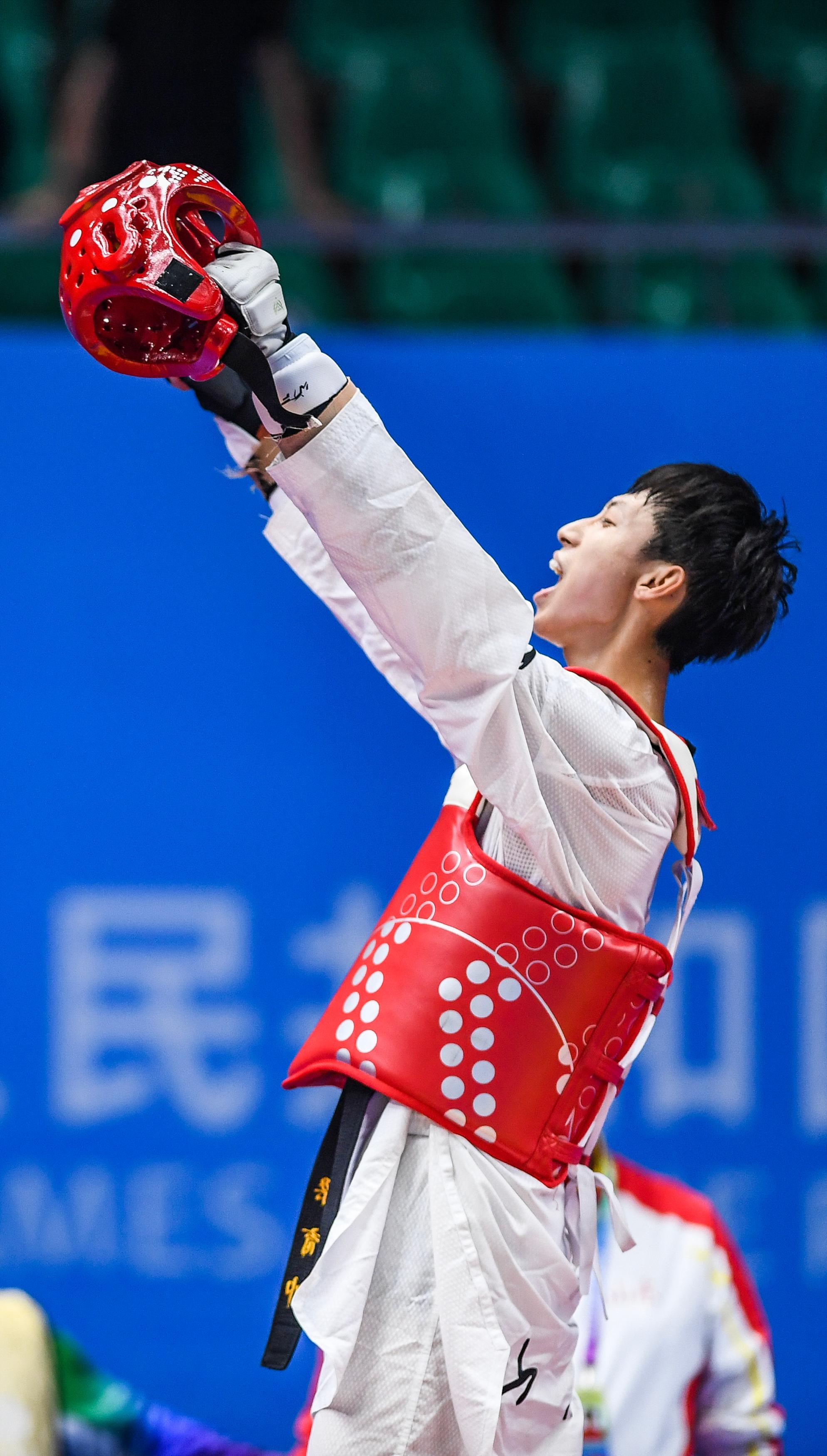 跆拳道——男子58公斤级决赛:梁育帅获金牌|跆拳道|山东队|金牌_新浪