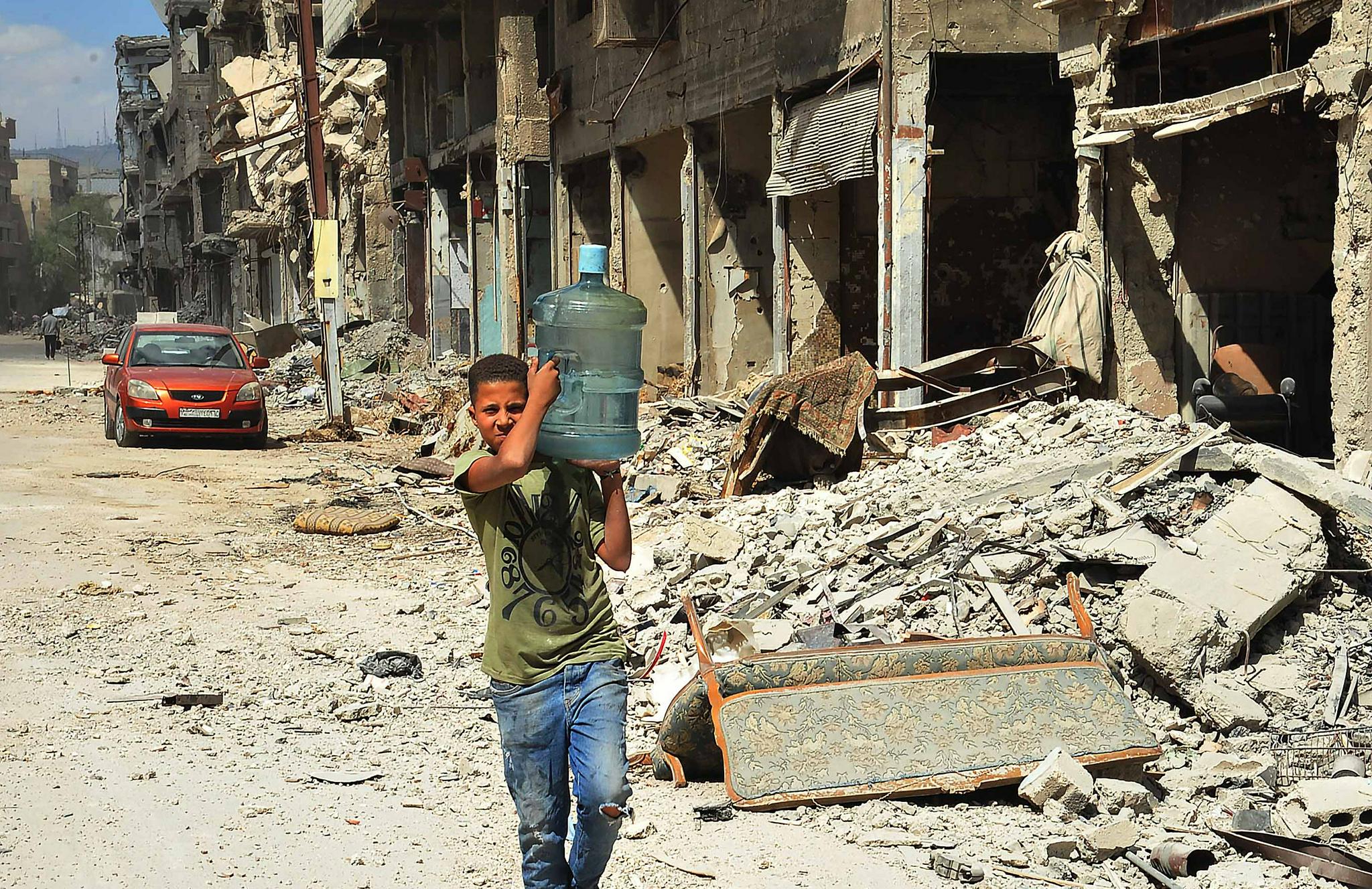 在叙利亚首都大马士革城南的巴勒斯坦难民聚居区——耶尔穆克难民营