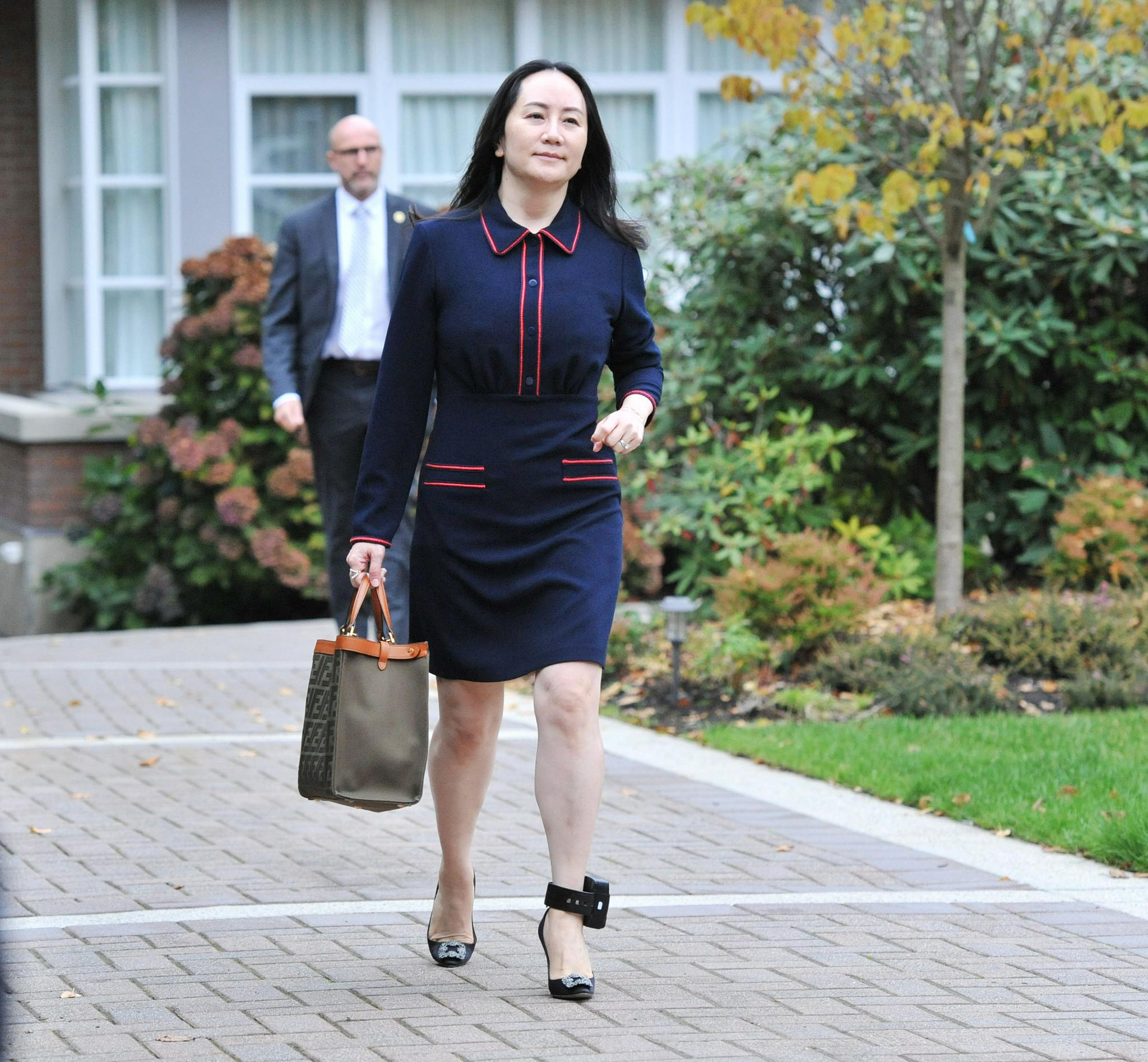 当地时间2020年10月27日,加拿大温哥华,孟晚舟出庭应诉 图源:视觉中国