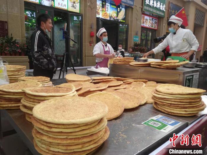 新疆昌吉州馕日生产能力达423万个 年销售额达20亿元