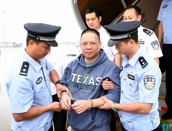 Xu Chaofan (middle) was forcibly repatriated. Source: Central Commission for Discipline Inspection and State Supervision Commission website