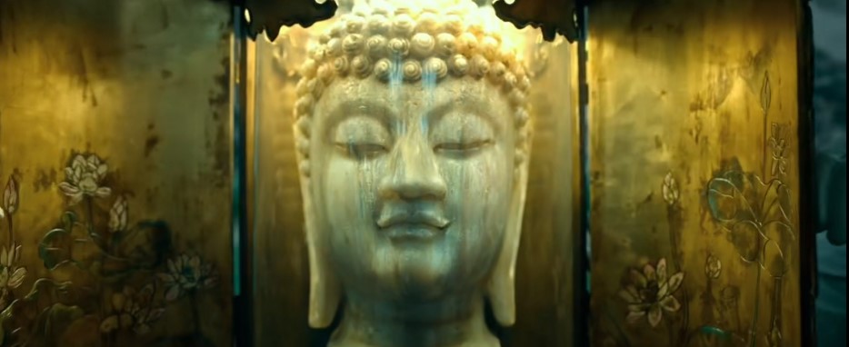 许愿在与佛头"过手"之后,发现佛头为假.