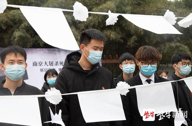 「国家公祭日」白菊纸鹤慰英烈 烛光点点寄哀思青年学子缅怀南京大屠杀遇难同胞休闲区蓝鸢梦想 - Www.slyday.coM