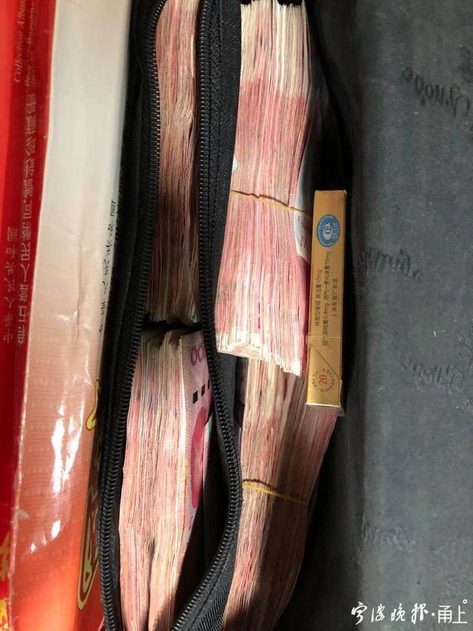 点赞!店门口捡到6万元现金,宁波这位店主悉数归还