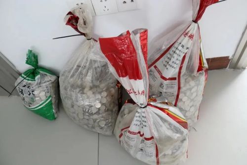公司老板因不满法院判决，拿2万多硬币到法院清偿又被罚款5万 ，支持吗？休闲区蓝鸢梦想 - Www.slyday.coM