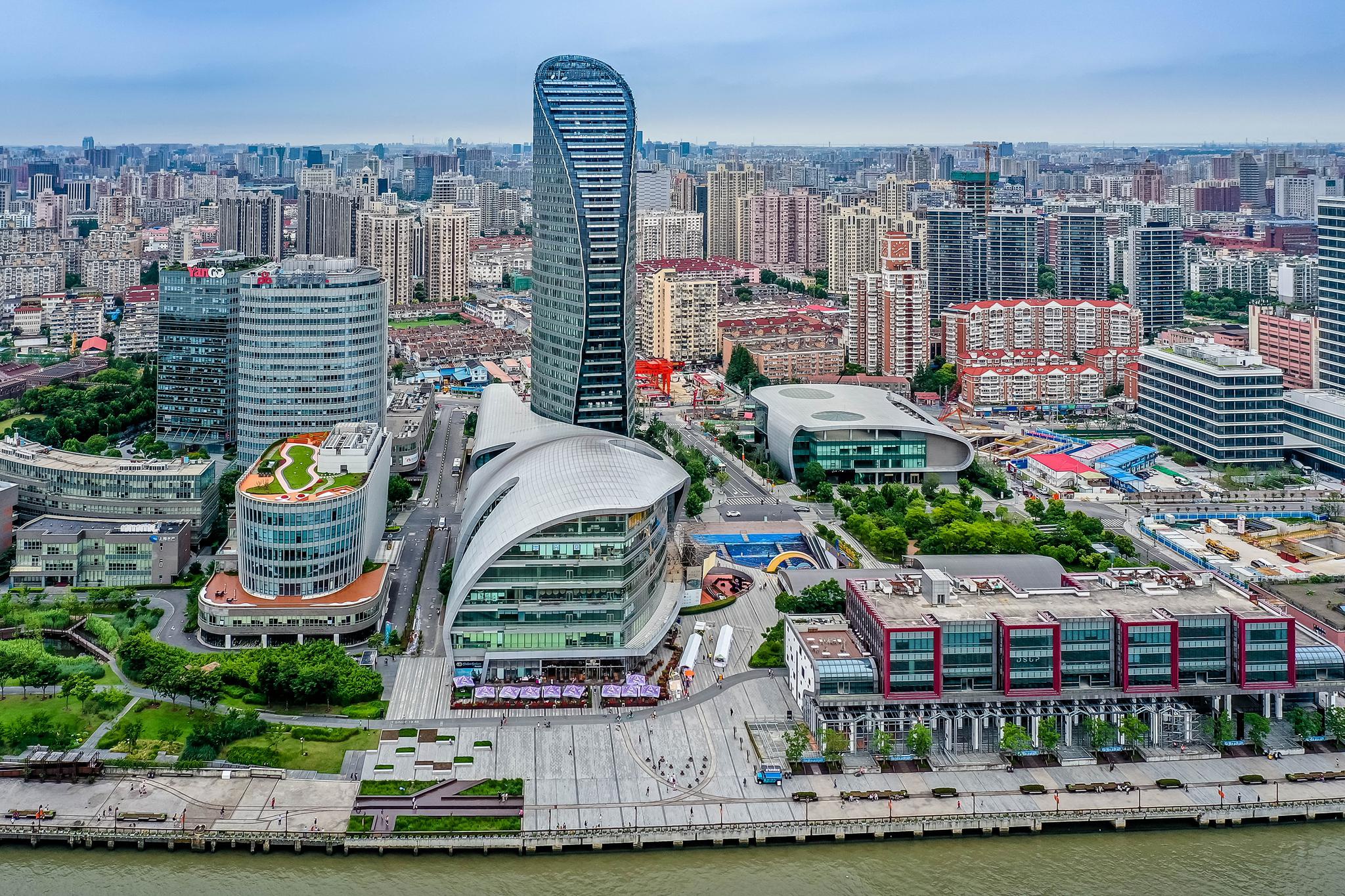 杨浦:开工首日15个重大项目签约,既要当好金牌"店小