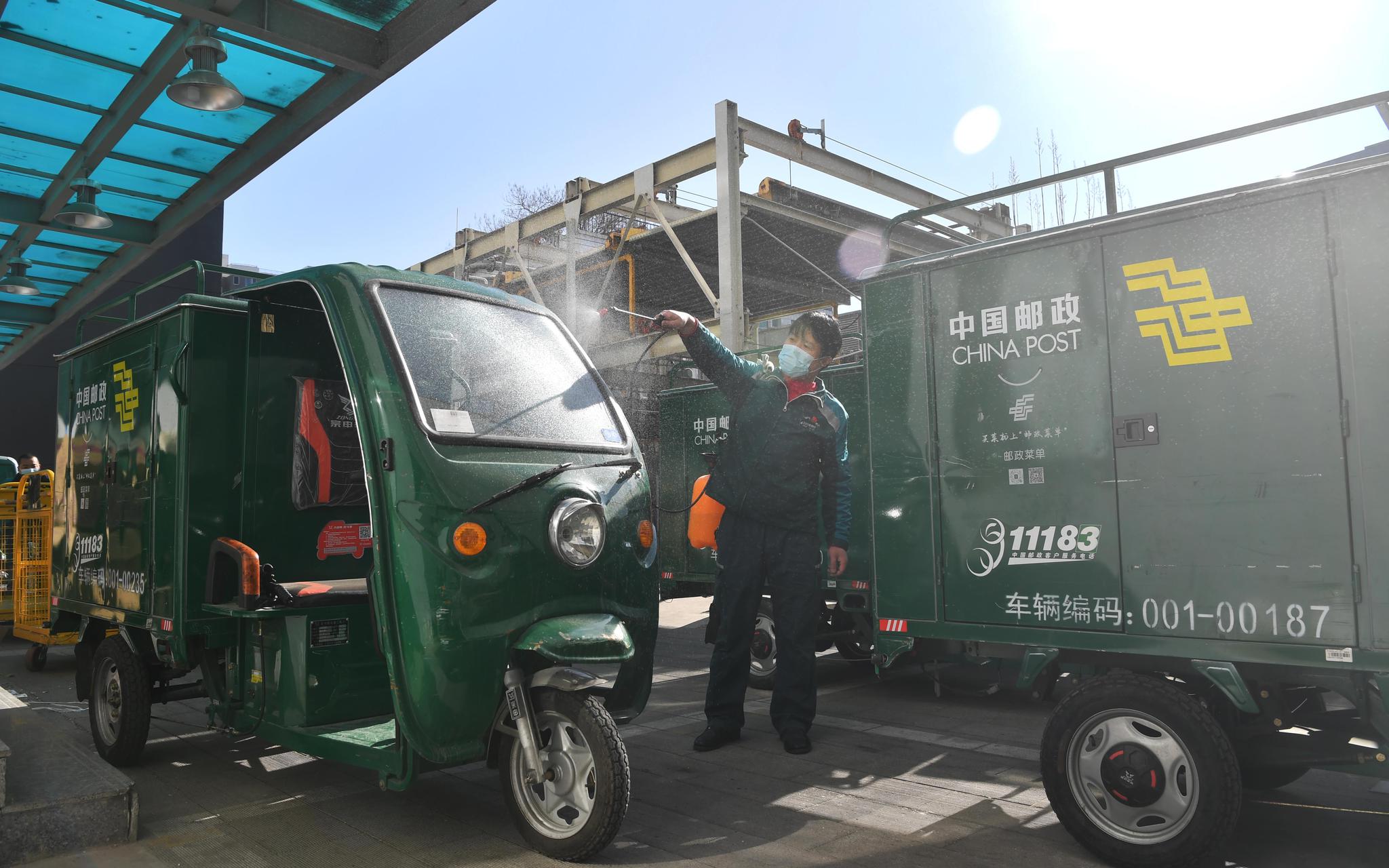 花式年货已上路北京邮政快件派送严格消杀