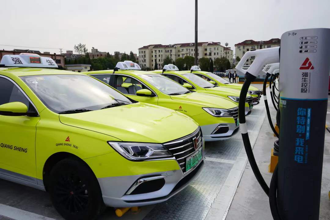 一片豆绿色,上海这家出租车龙头企业计划明年全用新能源车