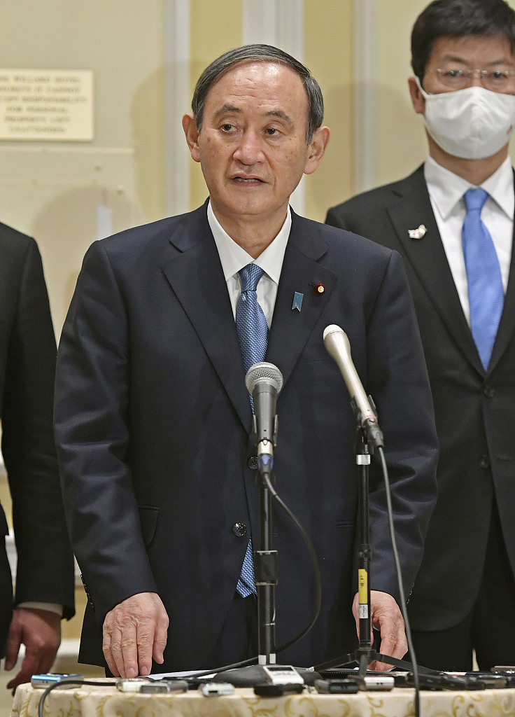 2021年4月16日,美国华盛顿特区,日本首相菅义伟访问美国,并与美国总统