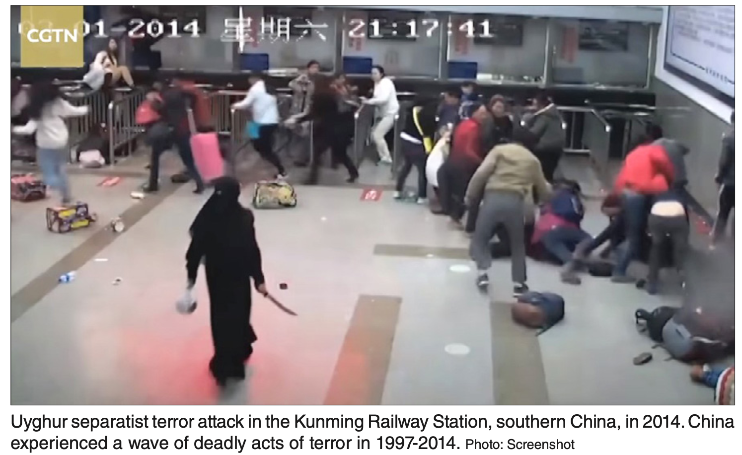 报告援引2014年暴力恐怖团伙袭击昆明火车站图片