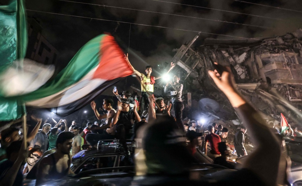 当地时间2021年5月21日，加沙地带，民众庆祝哈马斯与以色列达成停火协议。