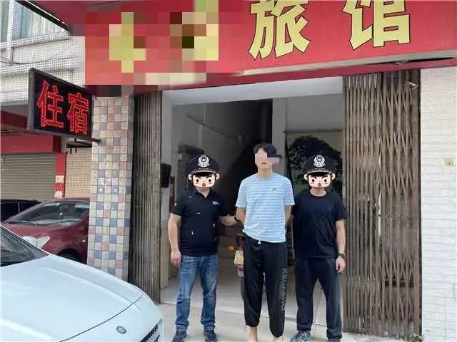 犯罪嫌疑人王某（中）被民警抓获