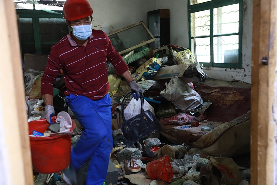 上海阿姨名下多套房产家里堆满垃圾被起诉，法院依法强制清理休闲区蓝鸢梦想 - Www.slyday.coM