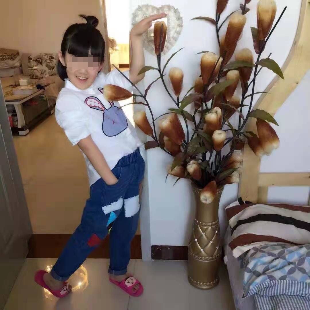 朵朵生活旧照。受访者供图 朵朵生活旧照。受访者供图