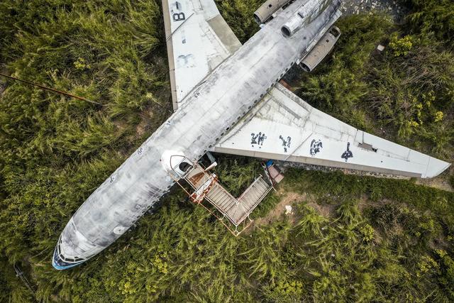 广东恩平水库湖畔现“僵尸飞机”：末日既视感十足休闲区蓝鸢梦想 - Www.slyday.coM