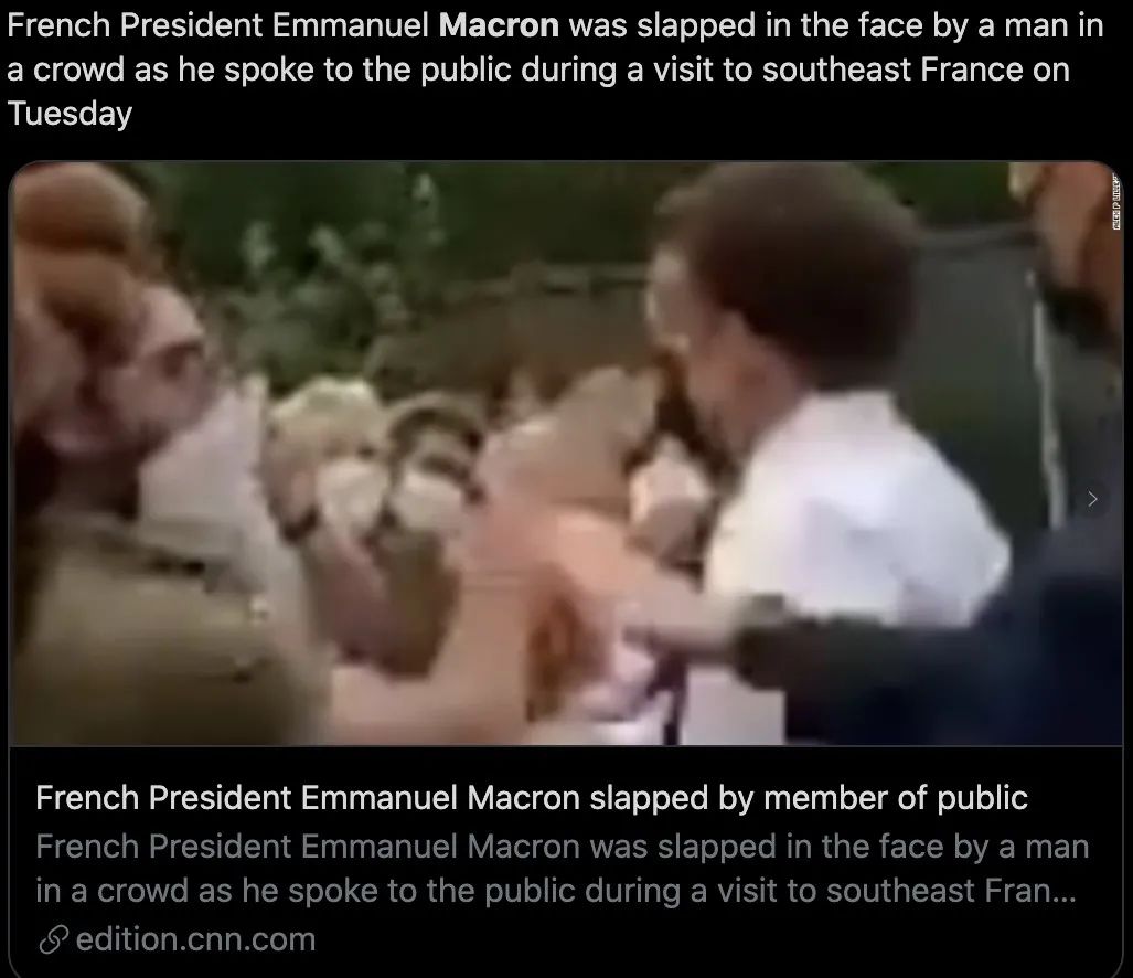法国总统马克龙在公共场合被扇耳光。/CNN报道截图