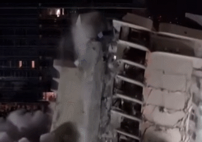 视频截图：公寓剩余建筑被爆破拆除