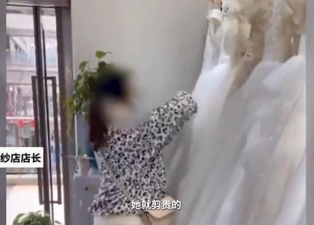 “赔就是了！”重庆一孕妇在婚纱店怒剪32件婚纱，事后道歉：特别后悔休闲区蓝鸢梦想 - Www.slyday.coM
