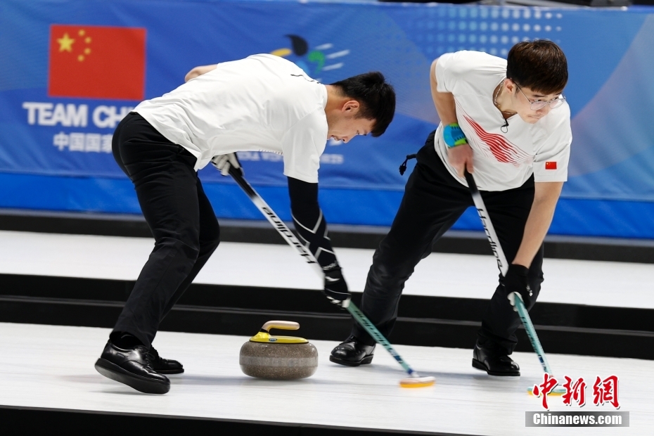 图为中国运动员在比赛中。 中新社记者 韩海丹 摄