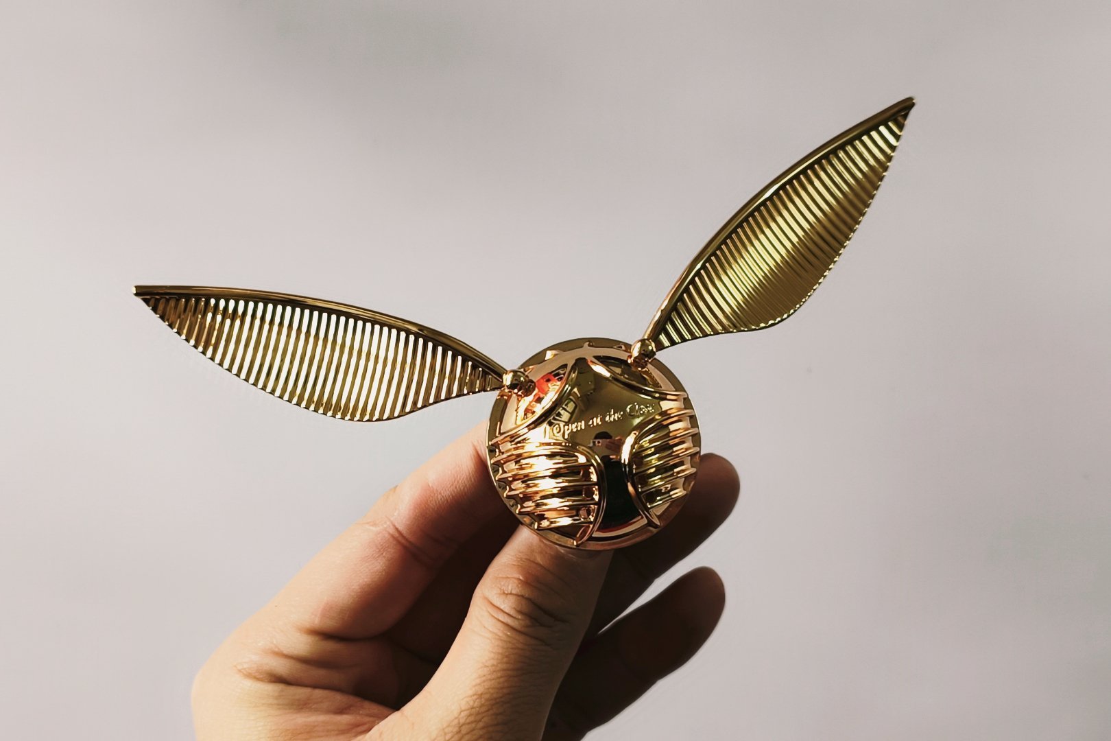 绿米新年送了一个哈利波特金色飞贼车载香薰