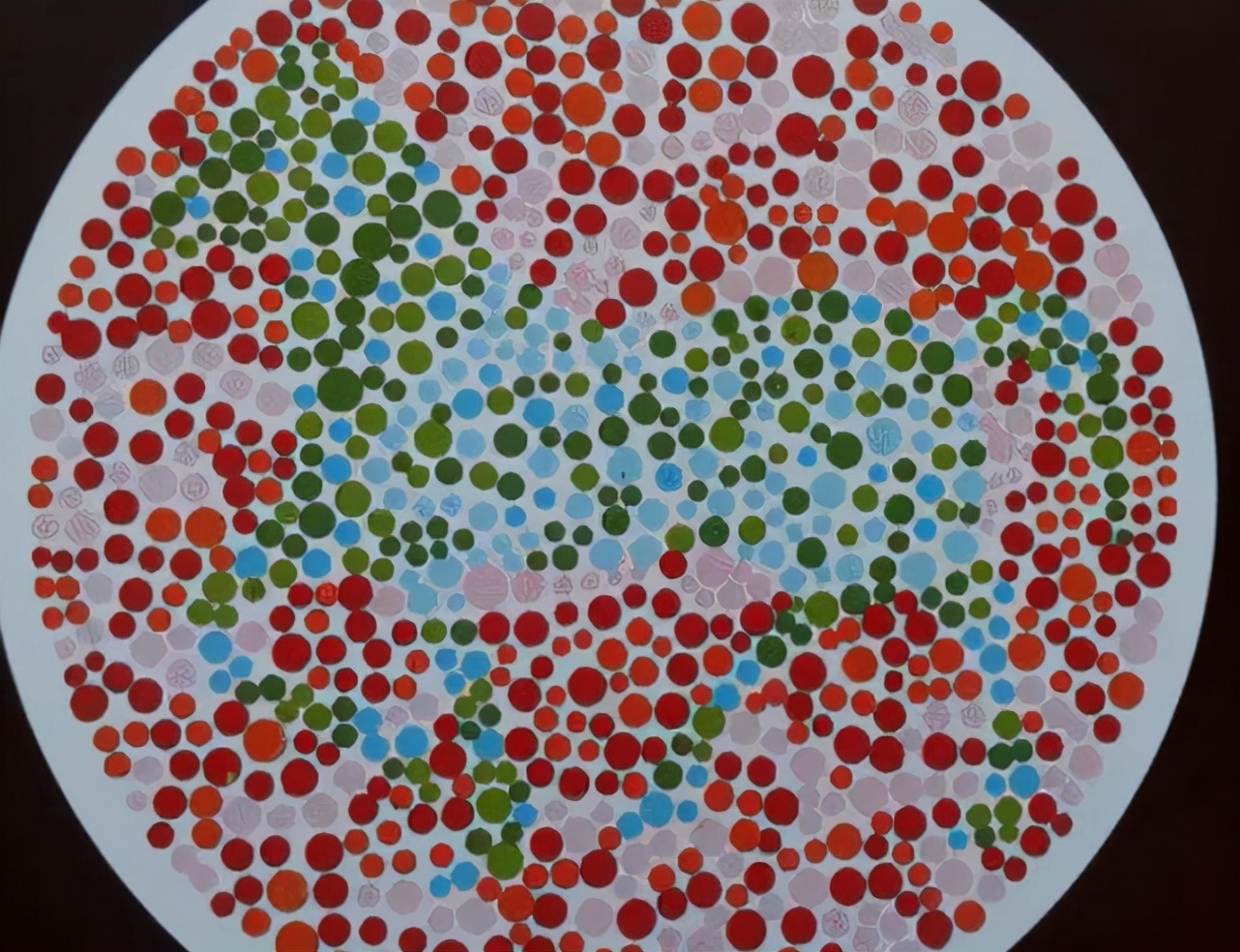 第四张色盲图是一个望远镜的形状,里面填满密集的小圆点.