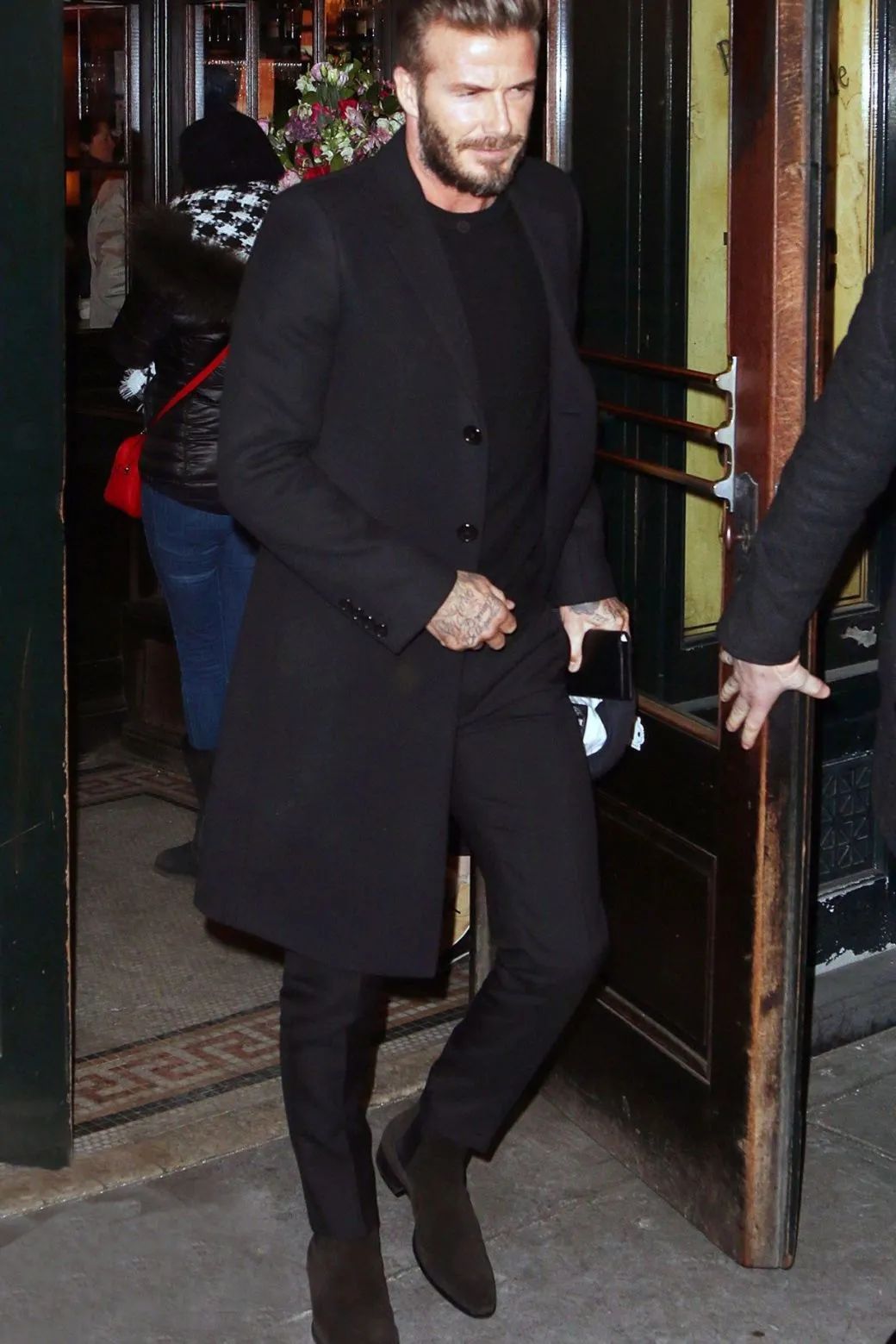 贝克汉姆每年秋冬造型都少不了切尔西靴