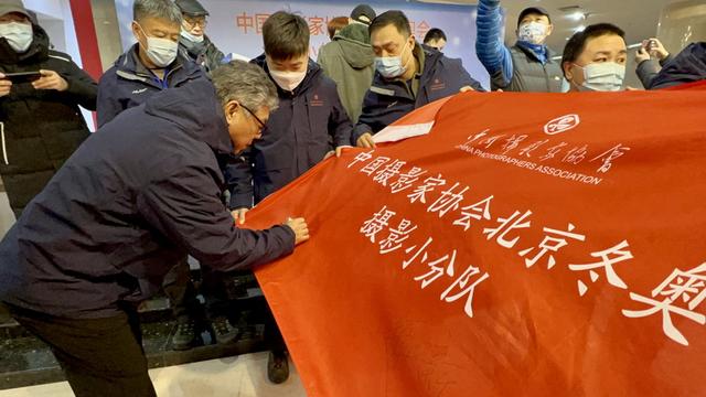 摄影部主任胡金喜,工人日报摄影记者王伟伟,《人民画报》摄影记者陈建
