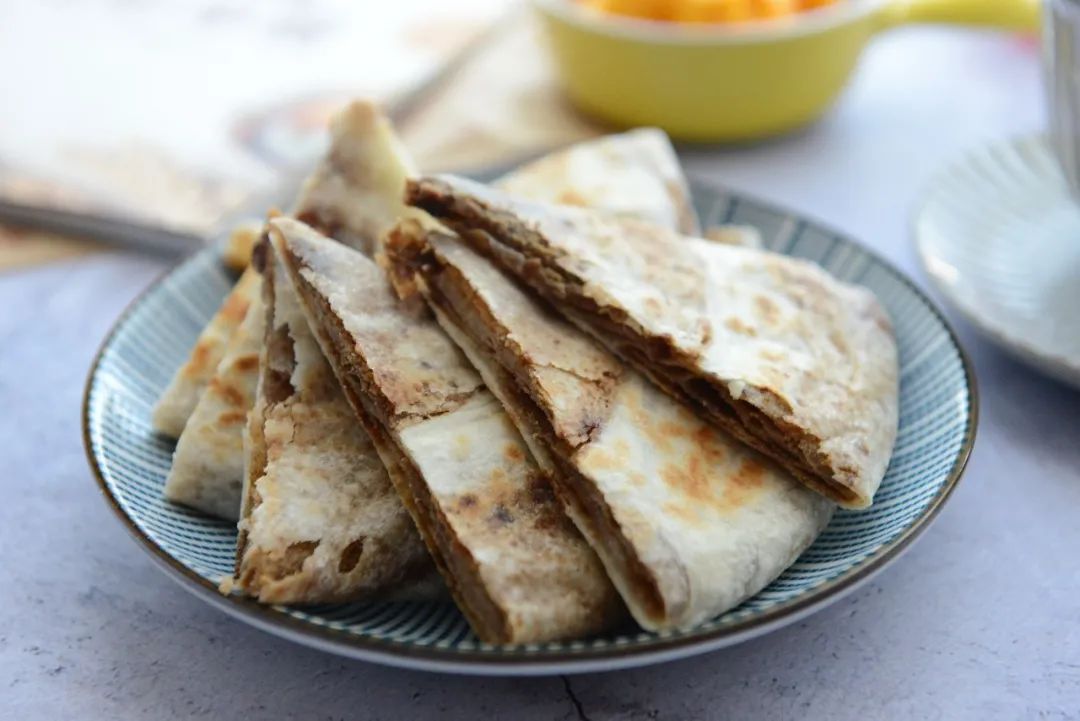 冬天最幸福的事情就是吃一口麻酱糖饼