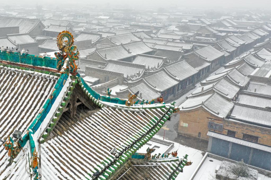 这是1月21日拍摄的平遥古城雪景（无人机照片）。新华社发（梁生仁摄）